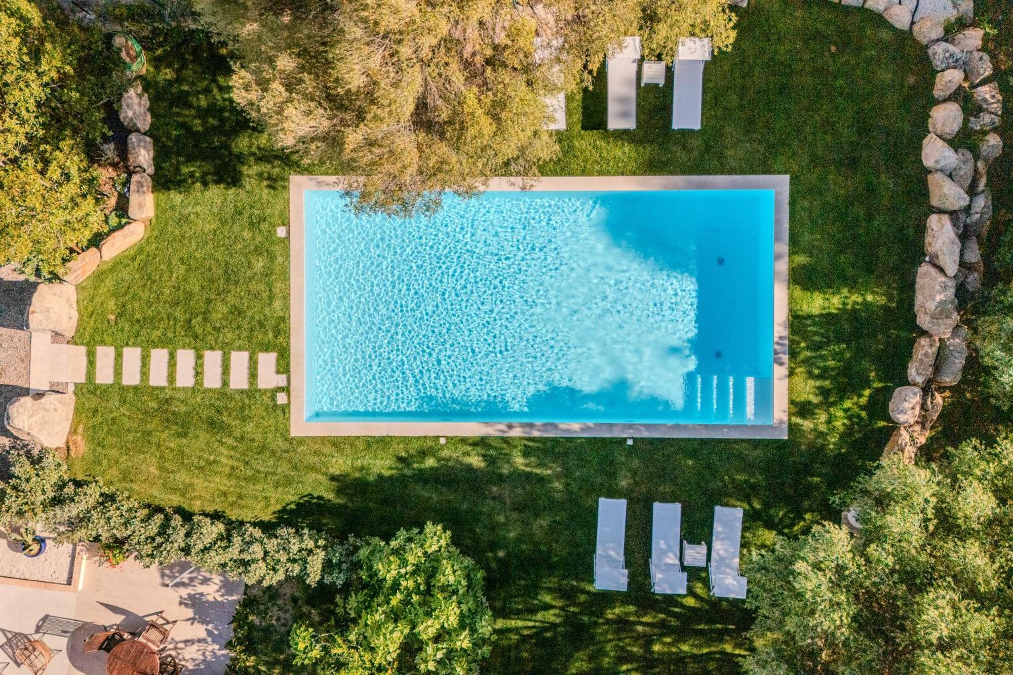شقة Stazzo San Teodoro L'Olivastro Piscina Condivisa المظهر الخارجي الصورة