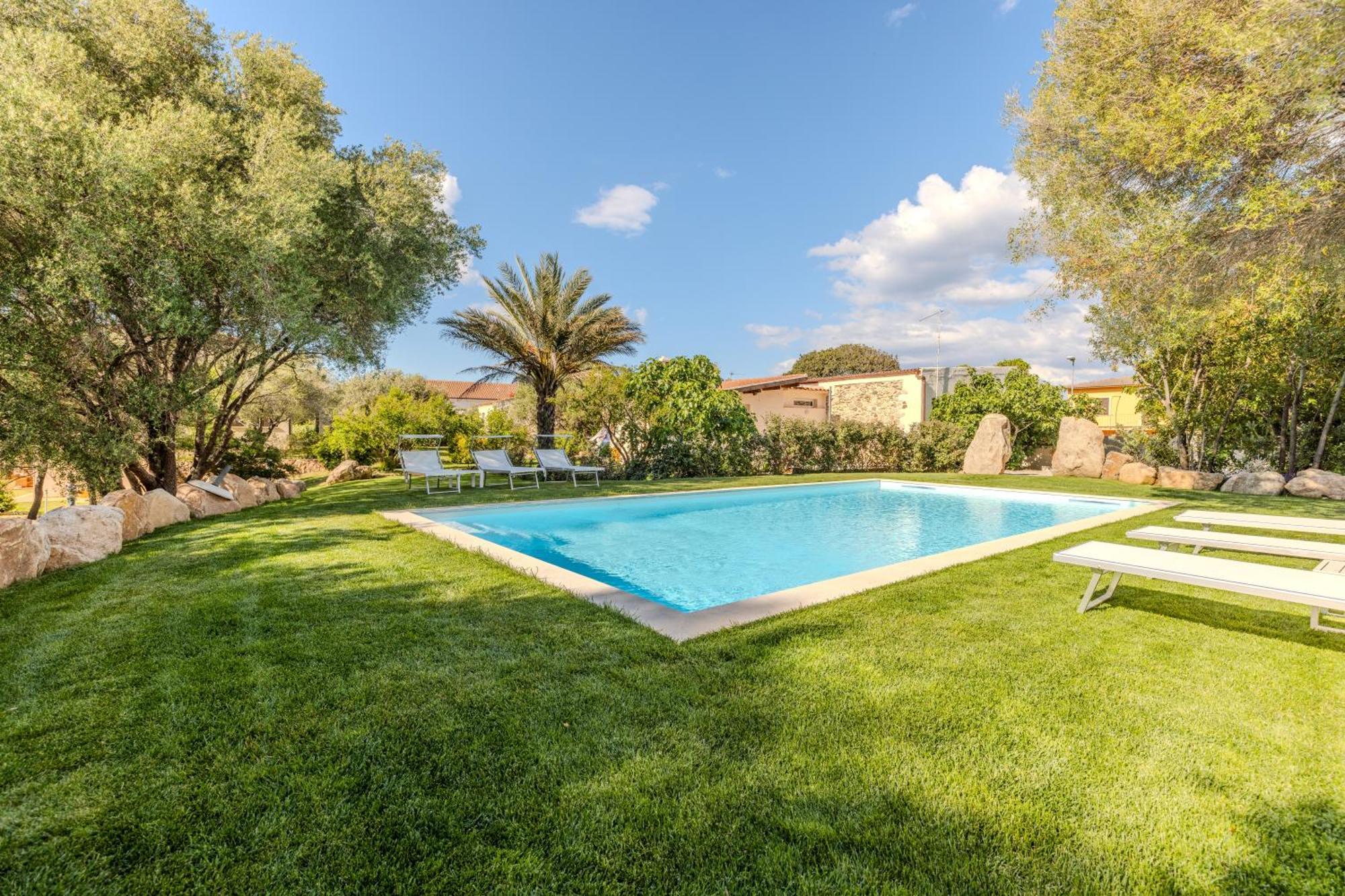 شقة Stazzo San Teodoro L'Olivastro Piscina Condivisa المظهر الخارجي الصورة