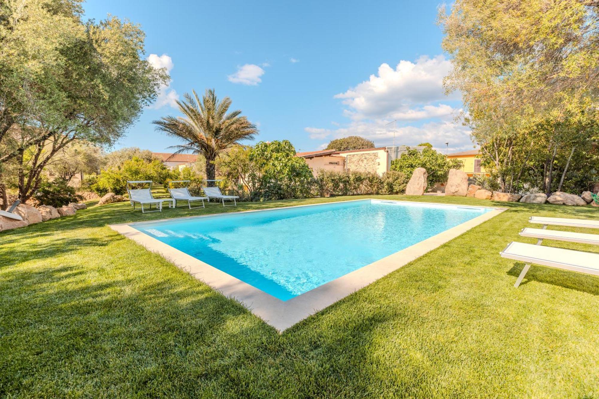 شقة Stazzo San Teodoro L'Olivastro Piscina Condivisa المظهر الخارجي الصورة