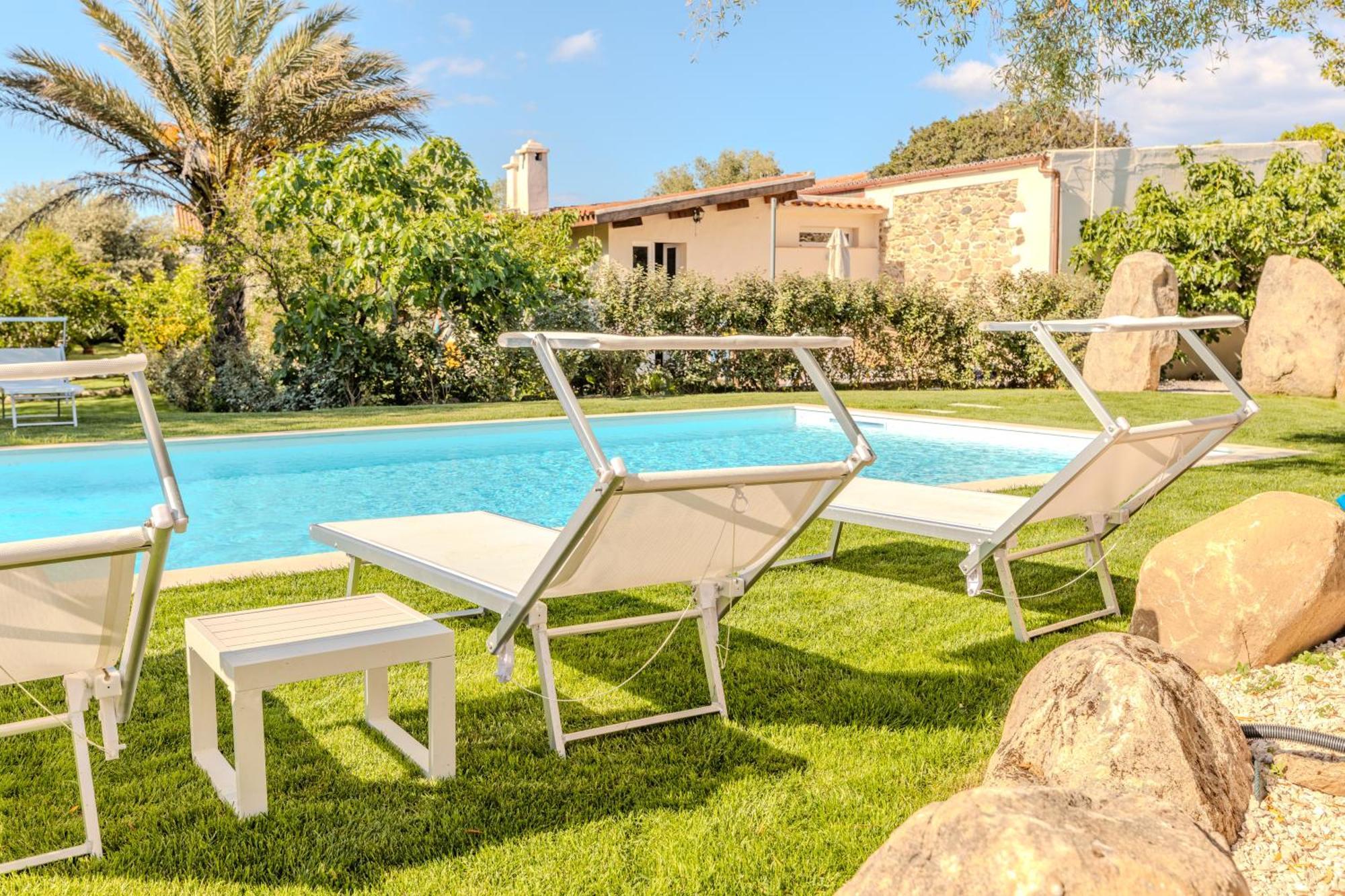 شقة Stazzo San Teodoro L'Olivastro Piscina Condivisa المظهر الخارجي الصورة